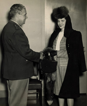 Patty Cox Owen receiving an award from General Groves for her work on the Manhattan Project, March 28, 1947